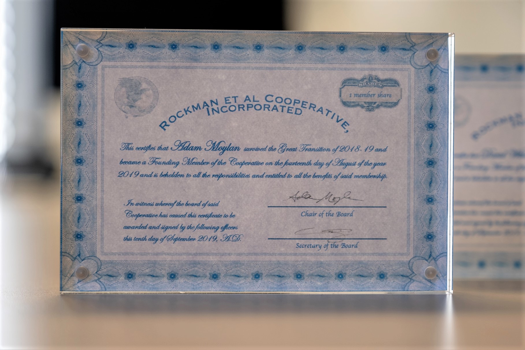 “Stock certificates” were handed out to everyone at their first member meeting as a memento to honor the final transition.