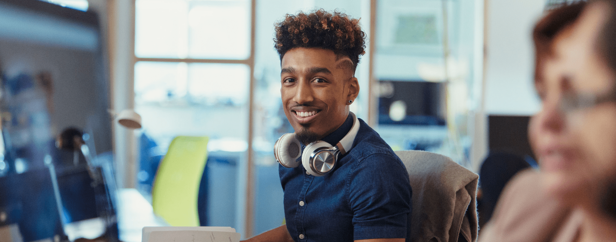 Man with headphones in office