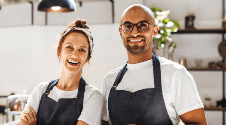 Two workers in kitchen