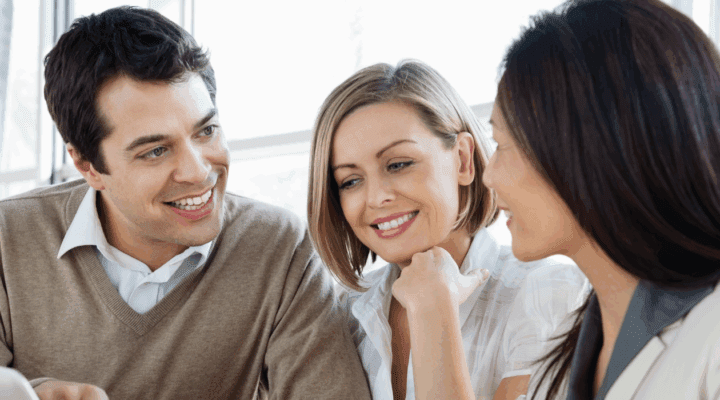 Three people talking